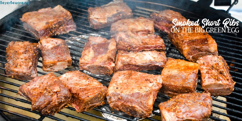 Grilled beef short ribs on the Big Green Egg are smoked with a beef barbecue rub and then slow-cooked to their final temperature in a bath of red wine, butter, and beef broth. 