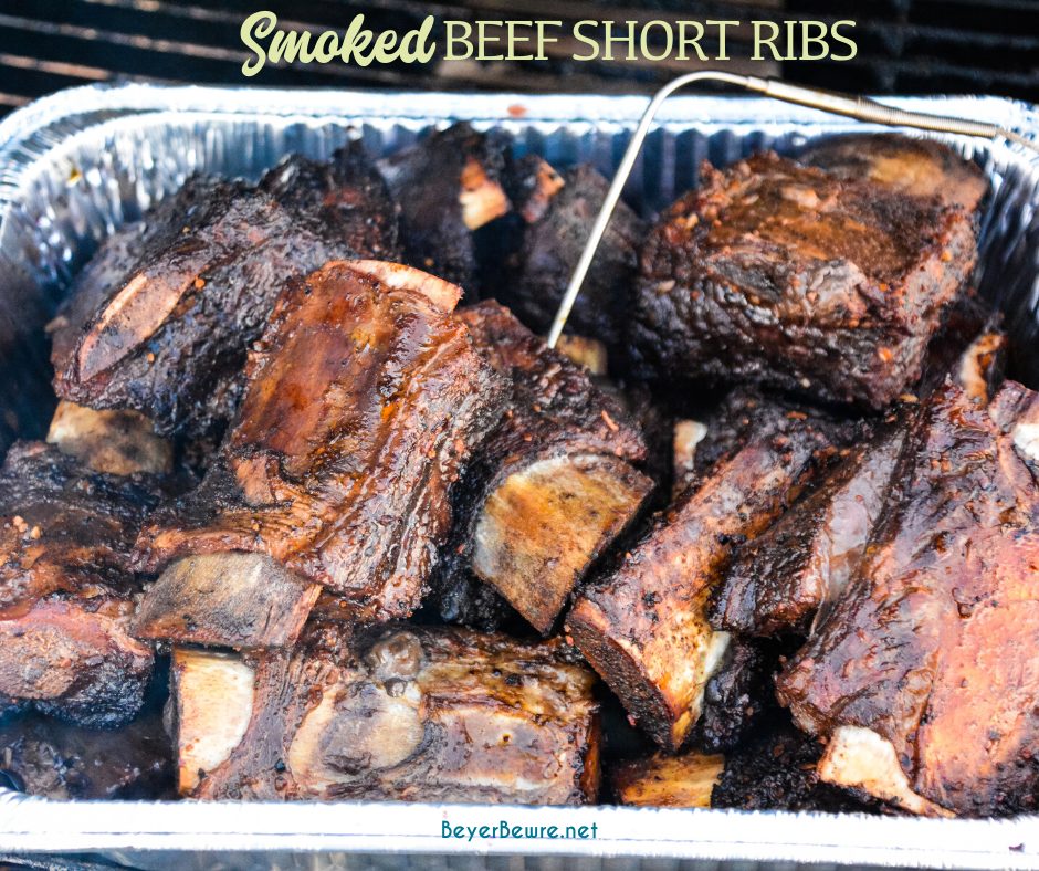 Grilled beef short ribs on the Big Green Egg are smoked with a beef barbecue rub and then slow-cooked to their final temperature in a bath of red wine, butter, and beef broth. 