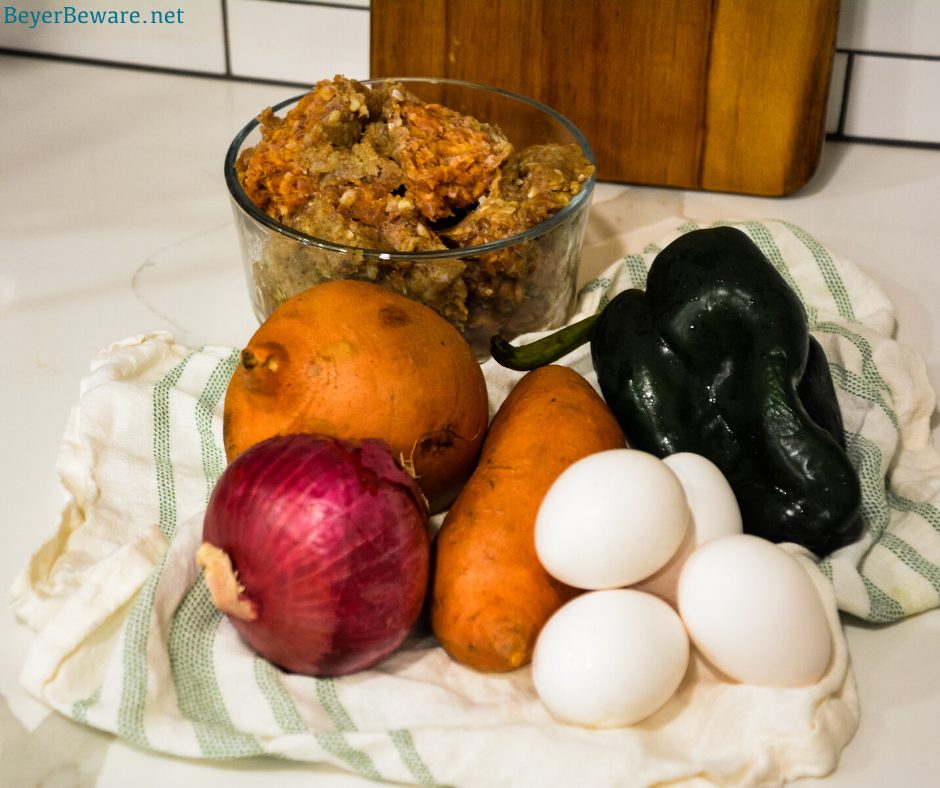 Here are the ingredients used in this sweet potato hash. Sweet potatoes - peeled Hot sausage - breakfast sausage will work just fine too Onions - purple for color but yellow, white, or sweet also Poblano peppers - these are totally optional, but if you aren't cooking with poblano peppers, you are missing out Eggs Seasonings and herbs - salt, pepper, and sage