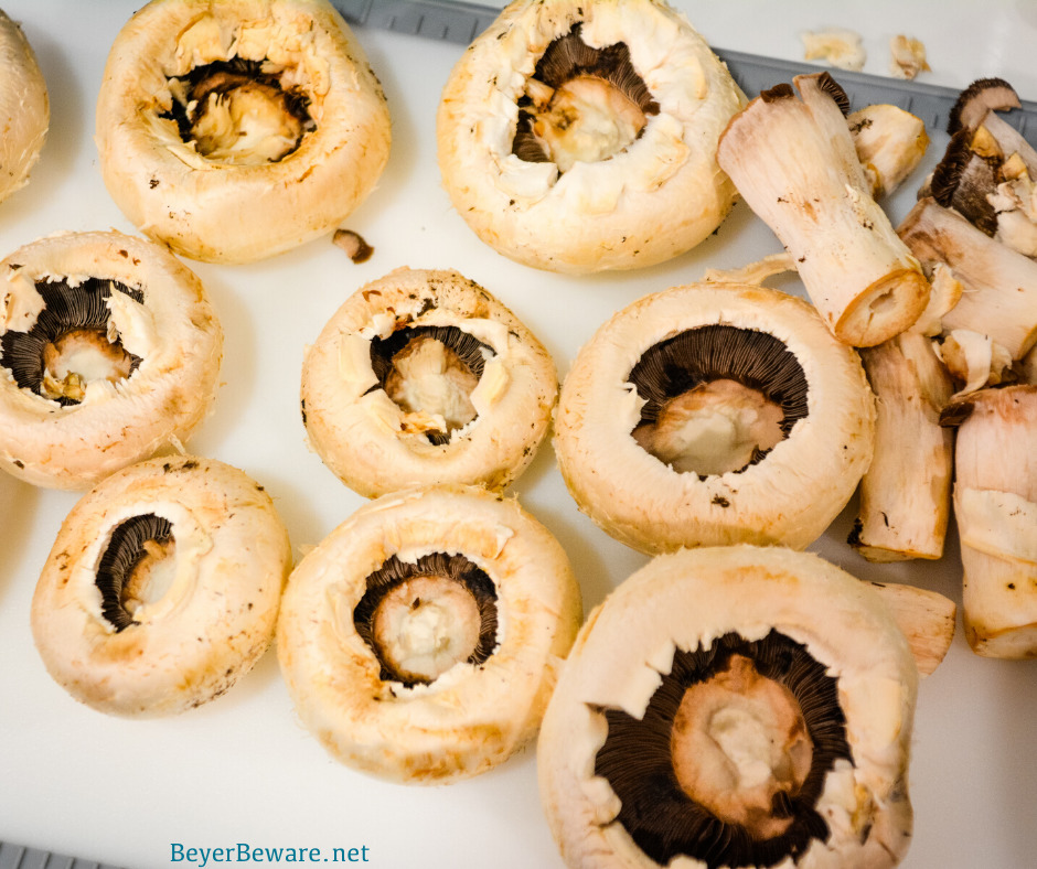 Large button mushrooms with stems removed