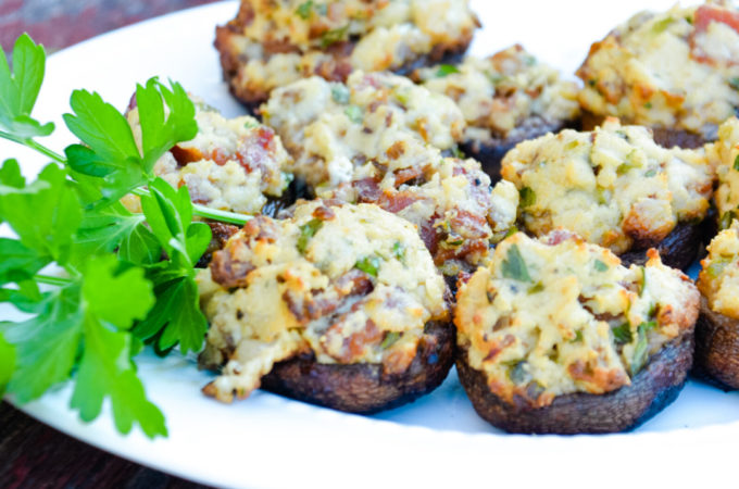 Bacon parmesan stuffed mushrooms are a gluten-free stuffed mushroom recipe is low-carb, filled with bacon, cheese, garlic, onions, and herbs that can be grilled or baked.