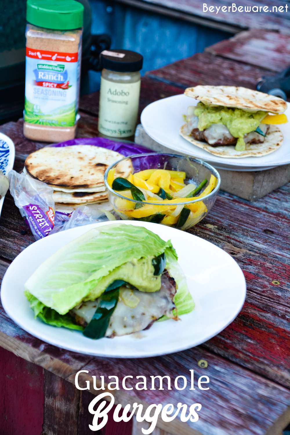 Guacamole burgers combine taco night with burger night straight from the grill with flavorful burgers, pepper-jack cheese, guacamole, sauteed onions, peppers, and street taco tortilla shells.