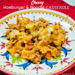 Cheesy hamburger and noodle casserole is an easy dinner recipe made with ground beef, noodles, tomato soup, and cheese for homemade hamburger helper kind of meal.