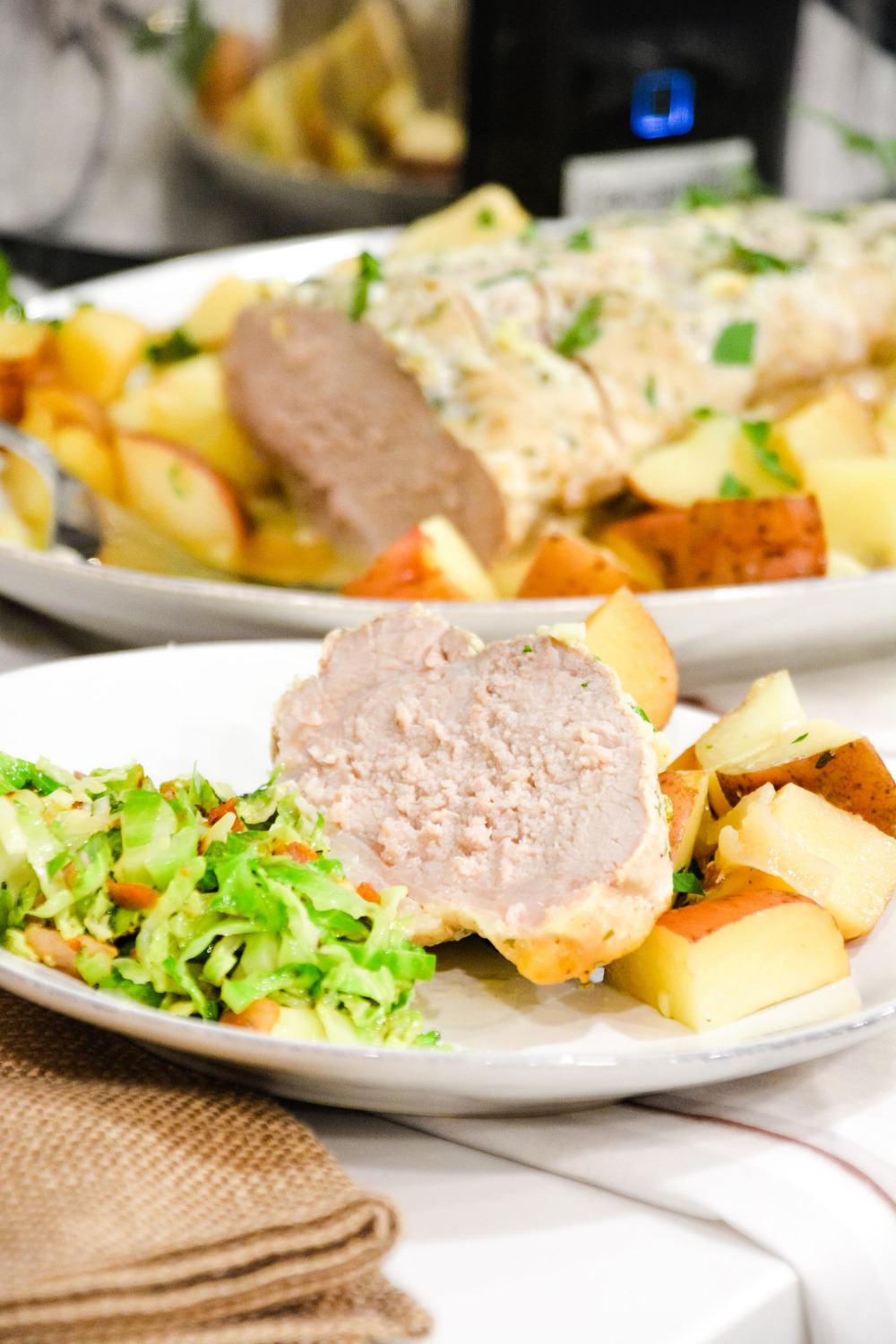 Crock pot pork loin roast and potatoes is an easy dump and go crock pot pot ranch pork loin recipe that will look and taste fancy when you serve it for dinner.