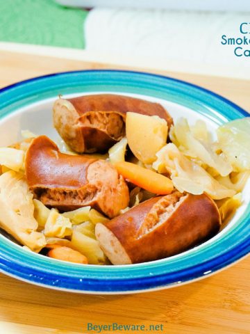 Crock Pot smoked sausage, cabbage, and potatoes is an easy dinner idea using garden fresh vegetables like cabbage, potatoes, onions, and carrots that have been slow cooked in the juices from the smoked sausage.