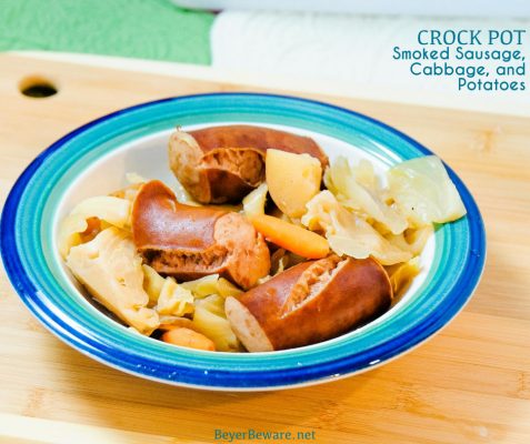 Crock Pot smoked sausage, cabbage, and potatoes is an easy dinner idea using garden fresh vegetables like cabbage, potatoes, onions, and carrots that have been slow cooked in the juices from the smoked sausage.