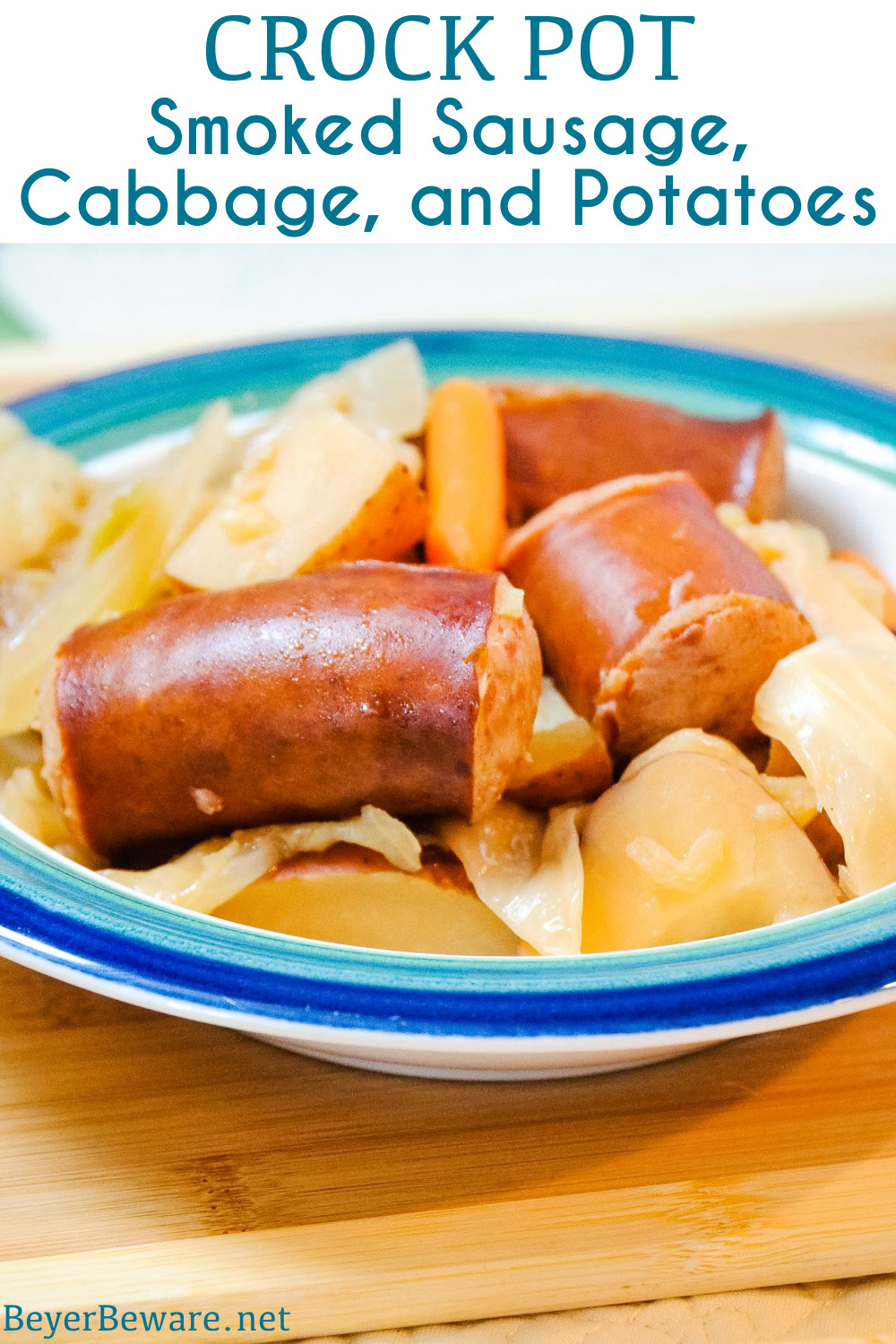 Crock Pot smoked sausage, cabbage, and potatoes is an easy dinner idea using garden fresh vegetables like cabbage, potatoes, onions, and carrots that have been slow cooked in the juices from the smoked sausage.