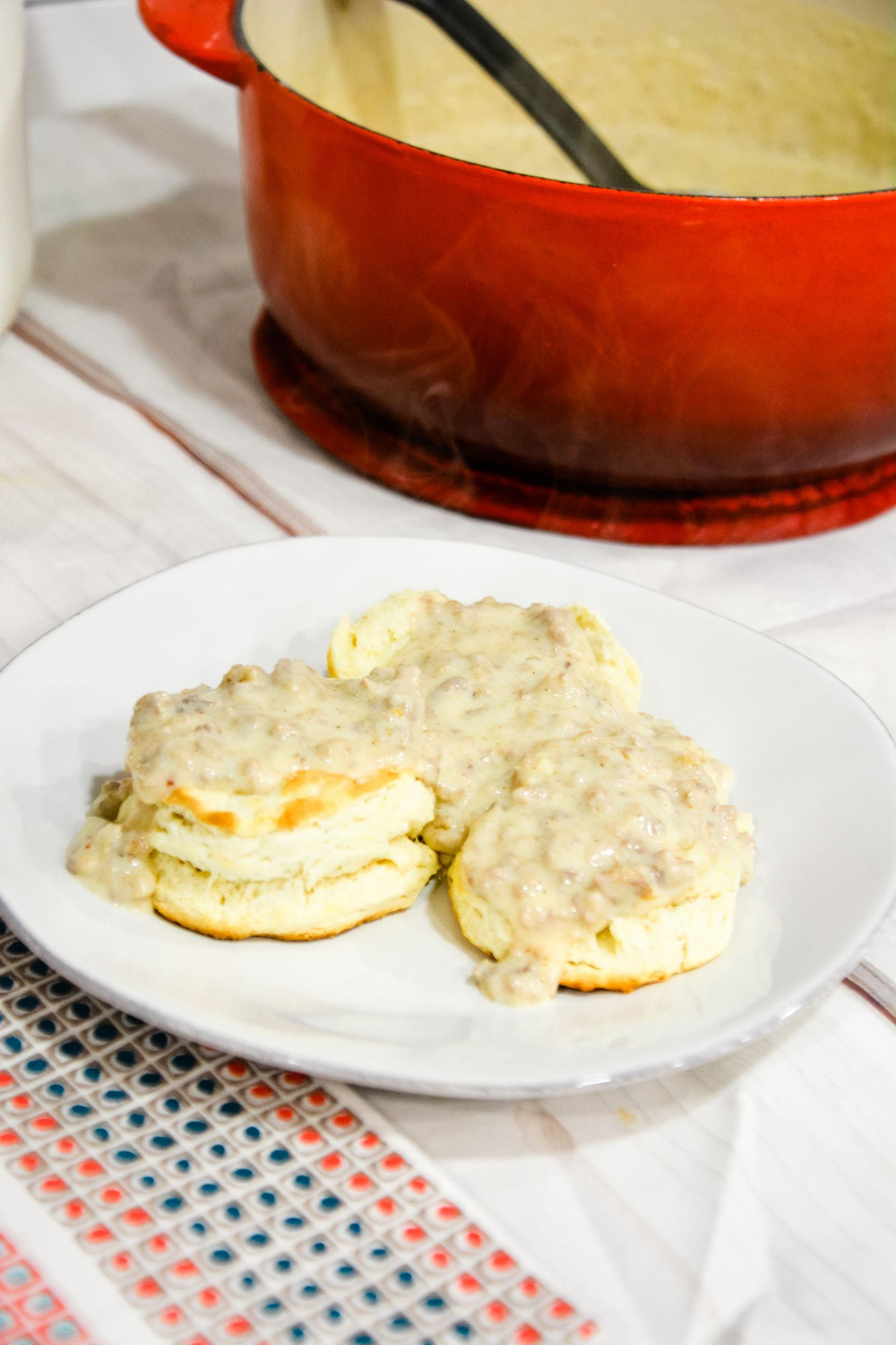 Homemade sausage gravy is a simple white gravy with breakfast sausage recipe perfect for easy biscuits and gravy breakfast made regularly for breakfast since it is so easy to make.