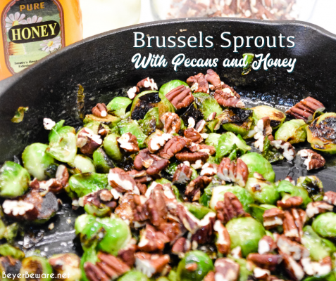 Brussels sprouts with pecans and honey is a cast iron skillet brussels sprout recipe that is a little sweet, nutty with a light cream sauce that is topped off with a drizzle honey.