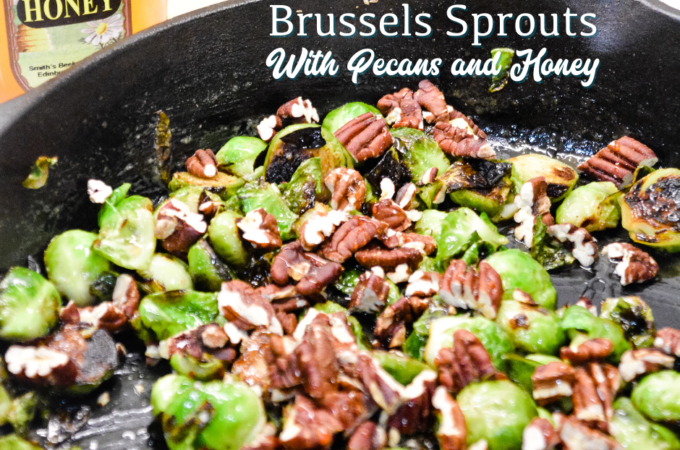 Brussels sprouts with pecans and honey is a cast iron skillet brussels sprout recipe that is a little sweet, nutty with a light cream sauce that is topped off with a drizzle honey.