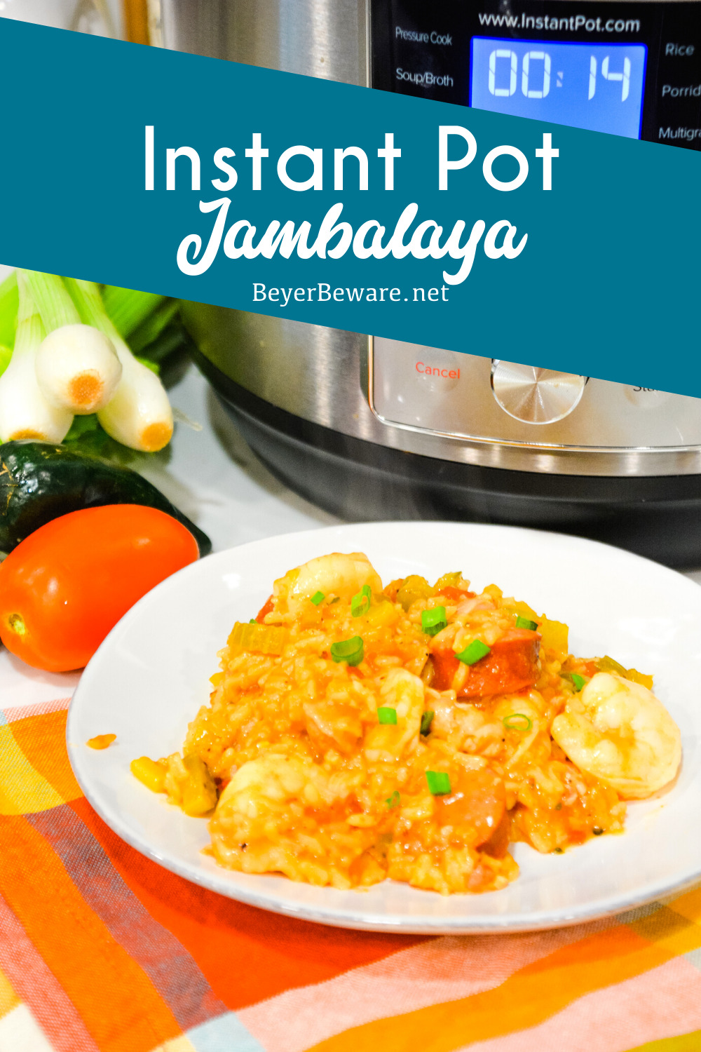 Instant Pot Jambalaya is a quick cajun recipe with spicy andouille sausage, chicken, shrimp, and rice pressure cooked in onions, celery, peppers, garlic, tomatoes, and creole seasonings.