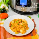 Instant Pot Jambalaya is a quick cajun recipe with spicy andouille sausage, chicken, shrimp, and rice pressure cooked in onions, celery, peppers, garlic, tomatoes, and creole seasonings.