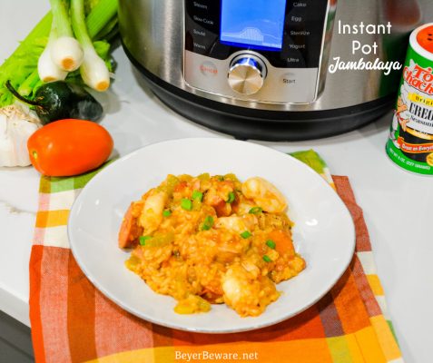 Instant Pot Jambalaya is a quick cajun recipe with spicy andouille sausage, chicken, shrimp, and rice pressure cooked in onions, celery, peppers, garlic, tomatoes, and creole seasonings.