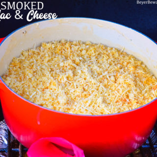 Smoked mac and cheese is an over the top macaroni and cheese recipe using a cheesy garlic white sauce combined with four kinds of cheese and then smoked on the Big Green Egg for an hour.