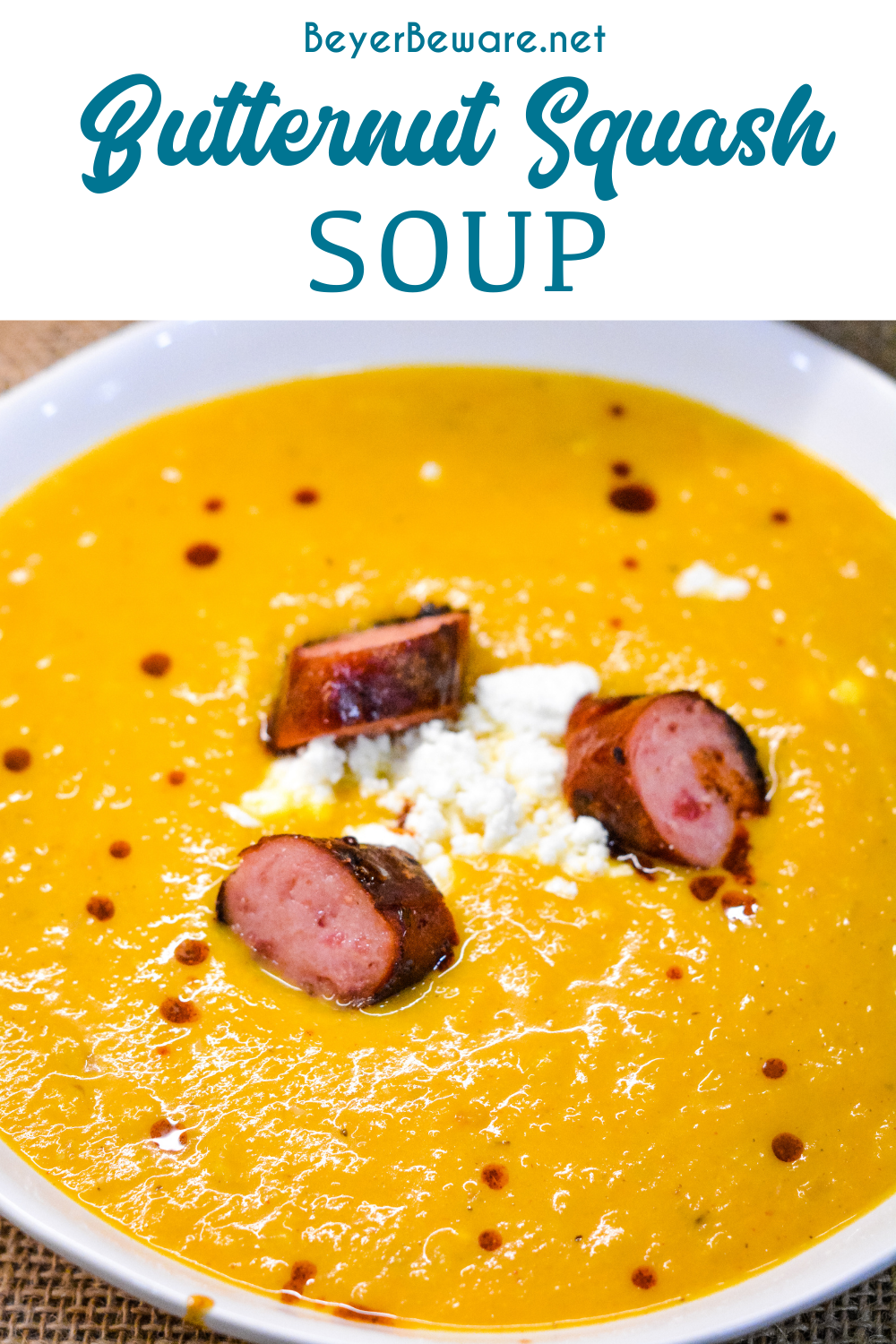 Butternut squash soup with smoked sausage is a savory, creamy roasted butternut squash soup with hints of chili, sage, onion and feta for a delish fall soup.