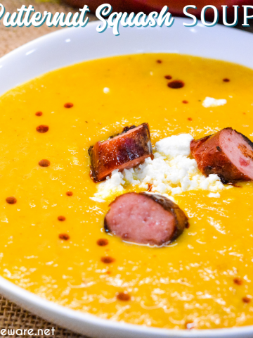 Butternut squash soup with smoked sausage is a savory, creamy roasted butternut squash soup with hints of chili, sage, onion and feta for a delish fall soup.