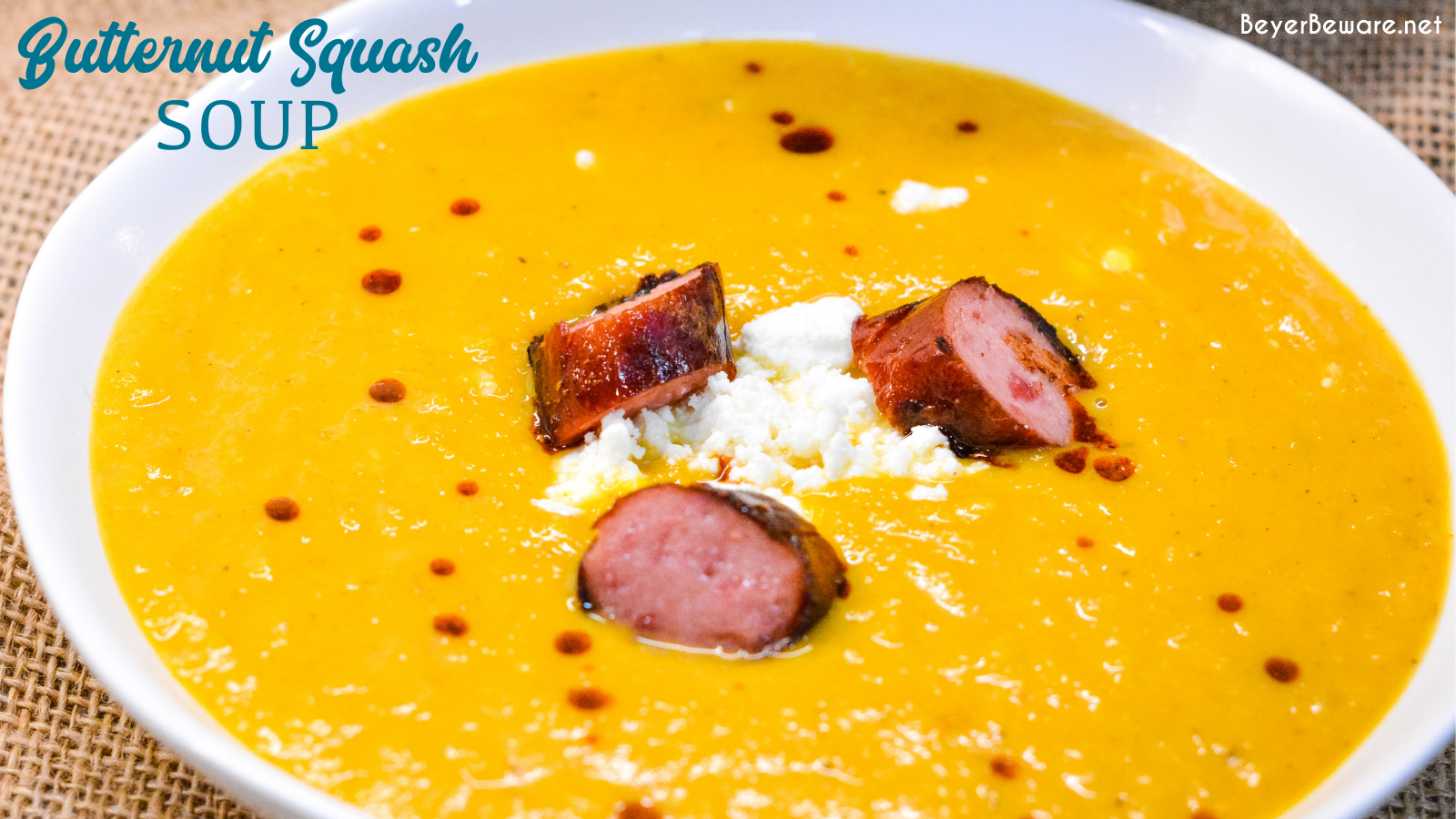 Butternut squash soup with smoked sausage is a savory, creamy roasted butternut squash soup with hints of chili, sage, onion and feta for a delish fall soup.