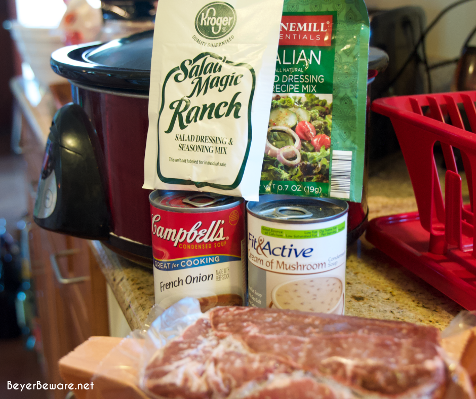 Crock pot beef cubed steak with gravy is a simple recipe that combines ranch and Italian seasoning and cream of mushroom soup and French onion soup with mushrooms, onions, and peppers for a tender cubed steak recipe that is perfect over mashed potatoes.