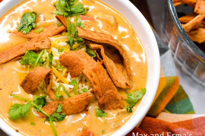 30-minute chicken tortilla soup is by far one of my family's favorite chicken soups and is the copycat recipe of the restaurant Max and Erma's chicken tortilla soup. This chicken tortilla soup is made with lots of cheese including velveeta, grilled chicken, and has lots of flavor from onions, garlic, green chilis and fire roasted tomatoes.