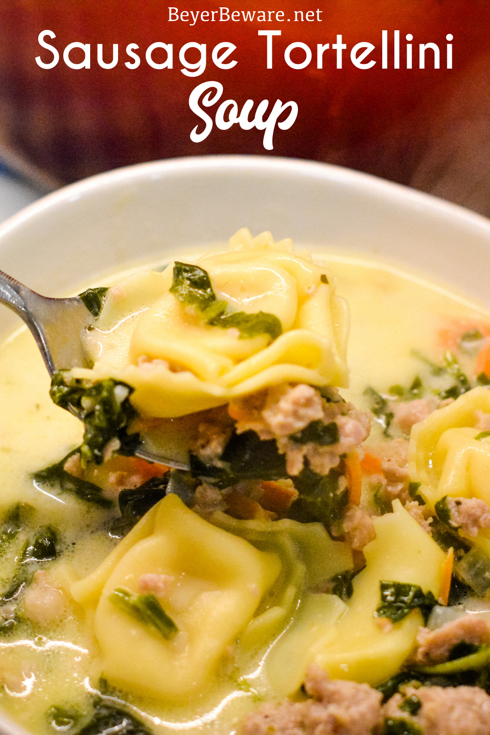 Sausage Tortellini Soup with spinach is a quick soup made on the stove all in one pot for a hearty, creamy soup full of spinach, sausage and cheese tortellini for an Italian sausage tortellini soup.