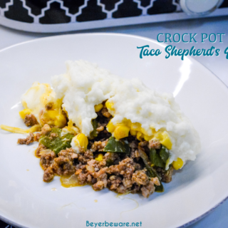 Taco Shepherd's Pie is an easy taco casserole made with leftover mashed potatoes, ground beef, corn, cheese, and peppers in the crock pot or oven.