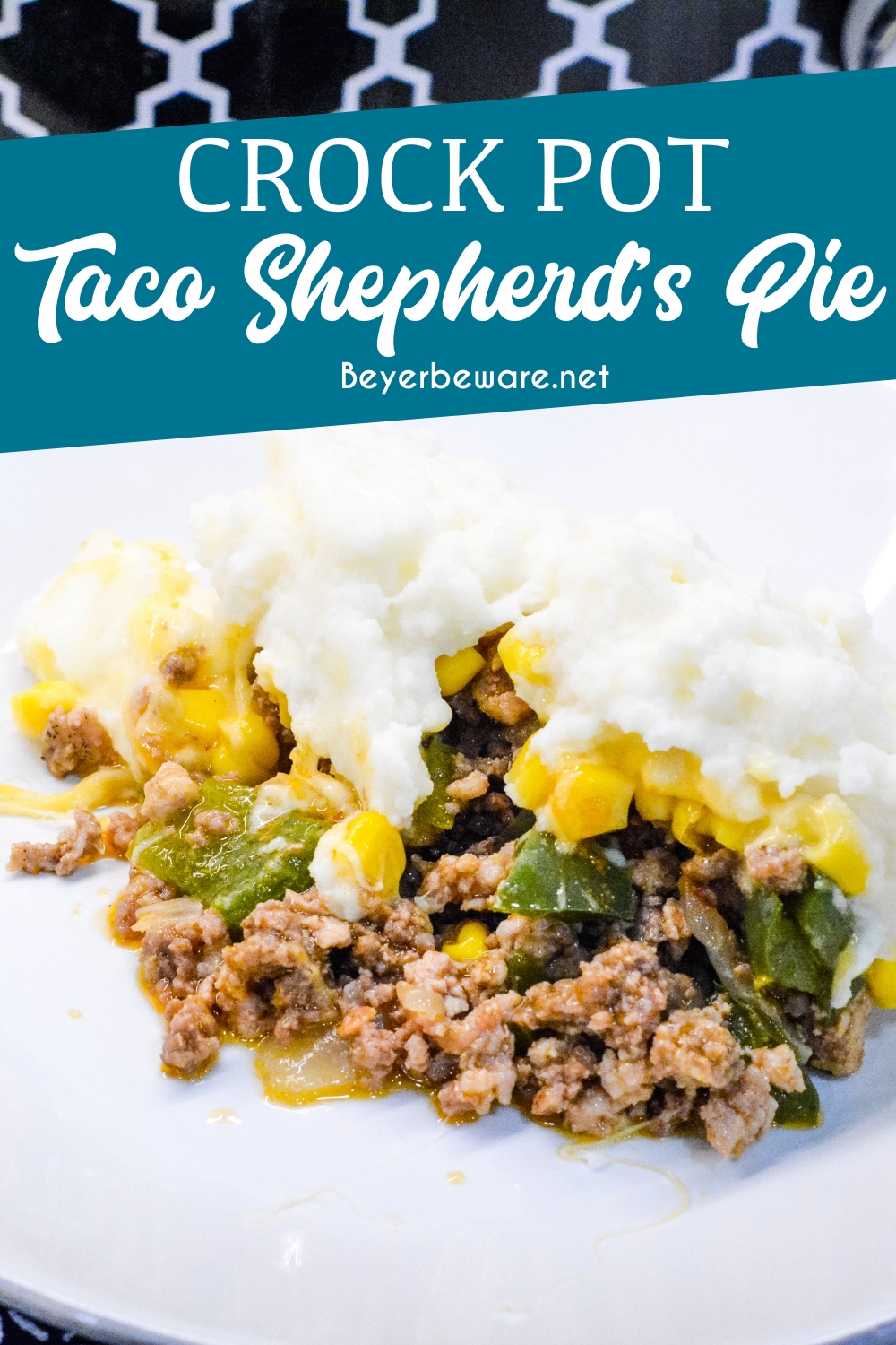 Taco Shepherd's Pie is an easy taco casserole made with leftover mashed potatoes, ground beef, corn, cheese, and peppers in the crock pot or oven.
