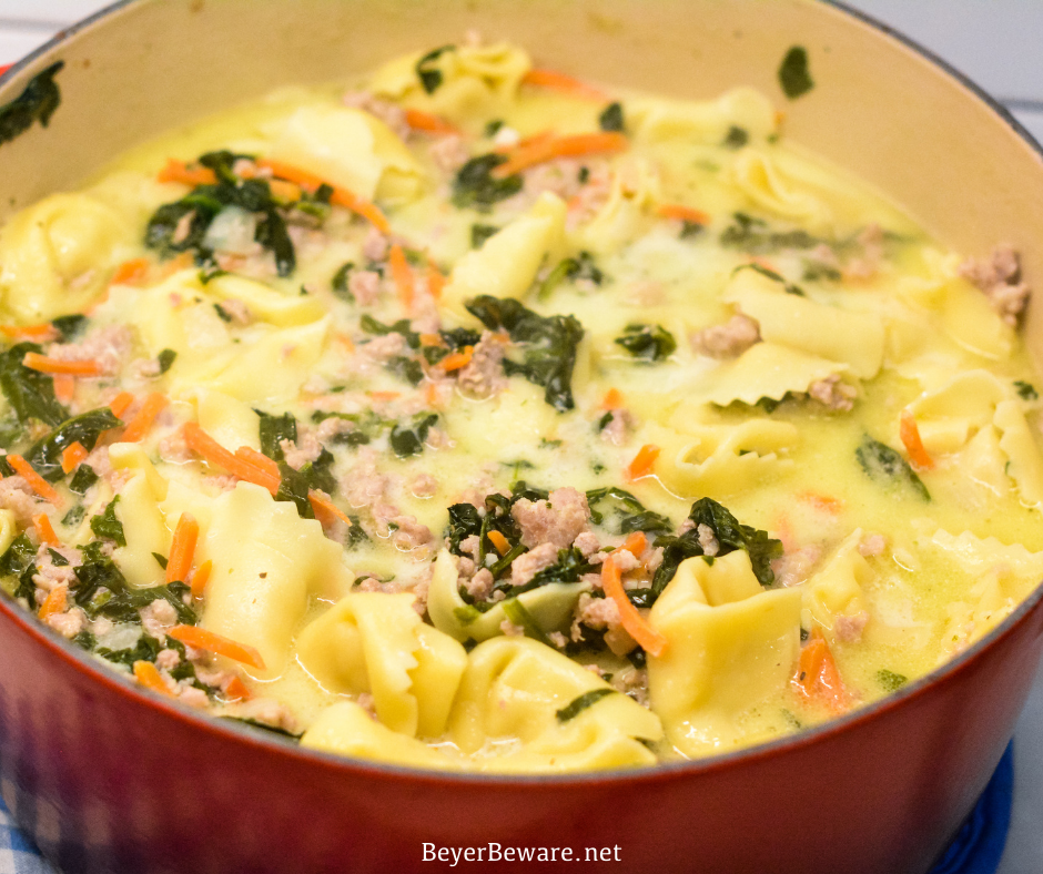 Sausage Tortellini Soup with spinach is a quick soup made on the stove all in one pot for a hearty, creamy soup full of spinach, sausage and cheese tortellini for an Italian sausage tortellini soup.