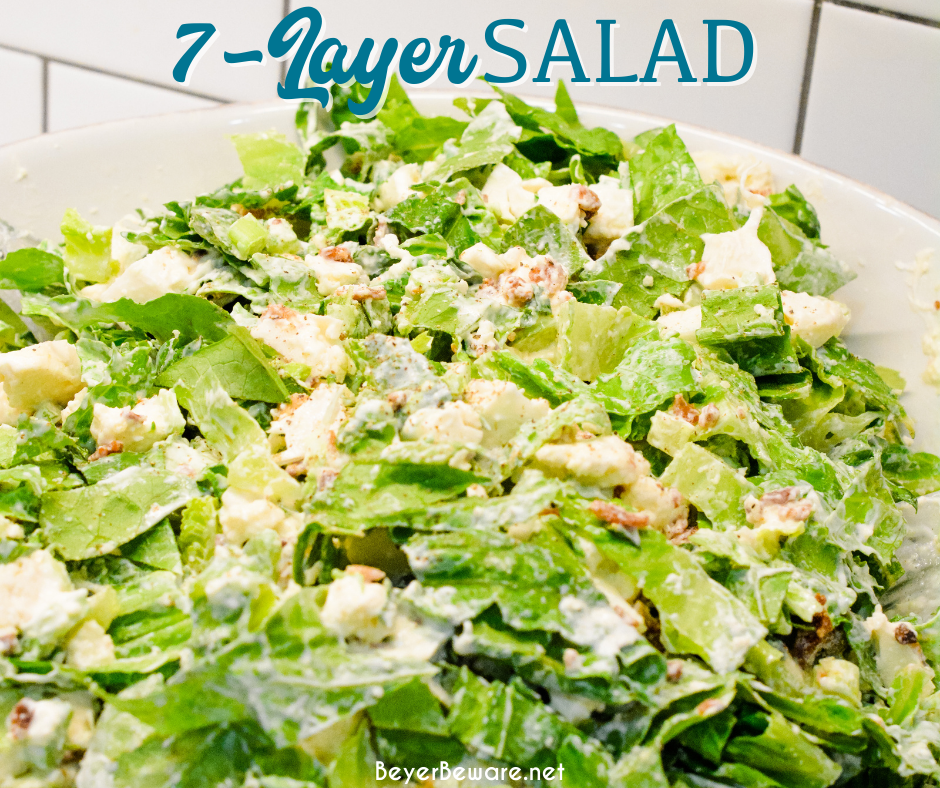 Overnight lettuce salad is my grandmother's version of 7 layer salad made with lettuce, cauliflower, mayonnaise, onions, celery, bacon, and parmesan cheese.