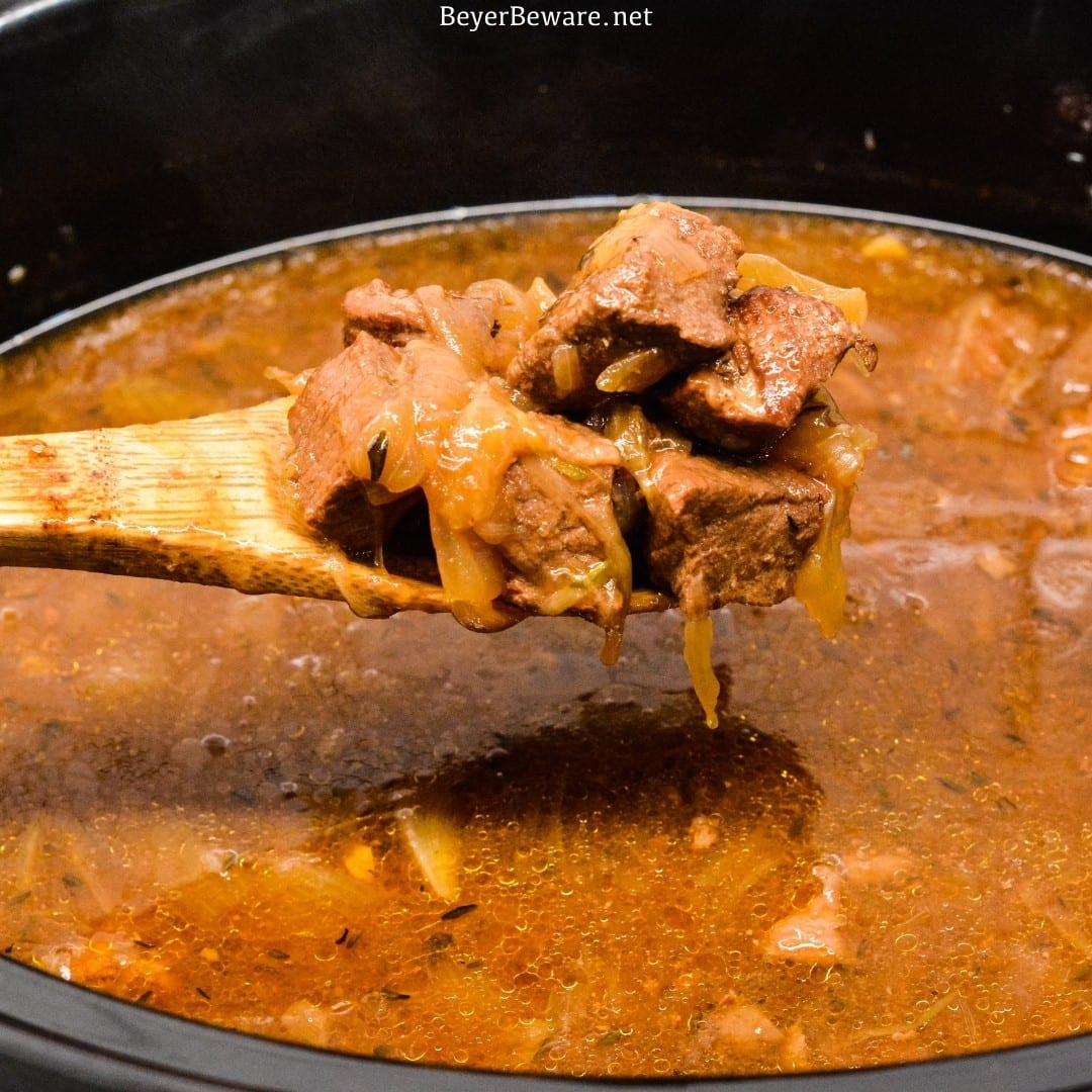 Crock Pot French Onion Beef Stew is a hearty French onion soup recipe that combines the rich flavors from the beef and caramelized onions for a buttery soup topped off with crusty bread or croutons and cheese.