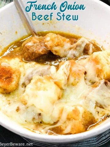 Crock Pot French Onion Beef Stew is a hearty French onion soup recipe that combines the rich flavors from the beef and caramelized onions for a buttery soup topped off with crusty bread or croutons and cheese.