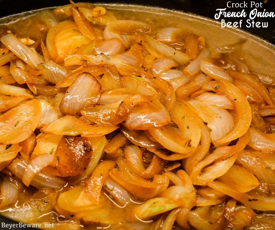 Crock Pot French Onion Beef Stew is a hearty French onion soup recipe that combines the rich flavors from the beef and caramelized onions for a buttery soup topped off with crusty bread or croutons and cheese.