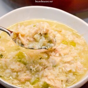 Grandma's chicken and rice soup is made from a whole chicken, onions, celery, and rice with seasonings, butter, and Better than Bouillon for spoonfuls of comfort.