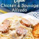 Cajun chicken alfredo with smoked sausage combines air fryer grilled chicken with andouille sausage pan sauteed in a skillet with garlic before being combined with alfredo and a creamy parmesan cajun alfredo sauce.