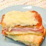 Croque Monsieur is an over the top grilled ham and cheese sandwich recipe that is made with King's Hawaiian bread, Smithfield smoked ham, swiss and gruyere cheese, and a mustard Bechamel sauce.