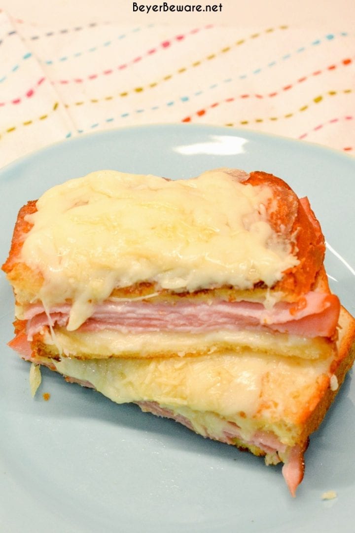 Croque Monsieur is an over the top grilled ham and cheese sandwich recipe that is made with King's Hawaiian bread, Smithfield smoked ham, swiss and gruyere cheese, and a mustard Bechamel sauce.