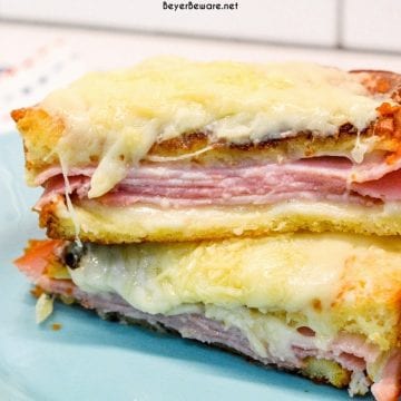 Croque Monsieur is an over the top grilled ham and cheese sandwich recipe that is made with King's Hawaiian bread, Smithfield smoked ham, swiss and gruyere cheese, and a mustard Bechamel sauce.