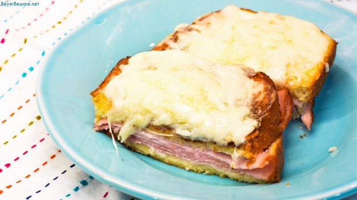 Croque Monsieur is an over the top grilled ham and cheese sandwich recipe that is made with King's Hawaiian bread, Smithfield smoked ham, swiss and gruyere cheese, and a mustard Bechamel sauce.