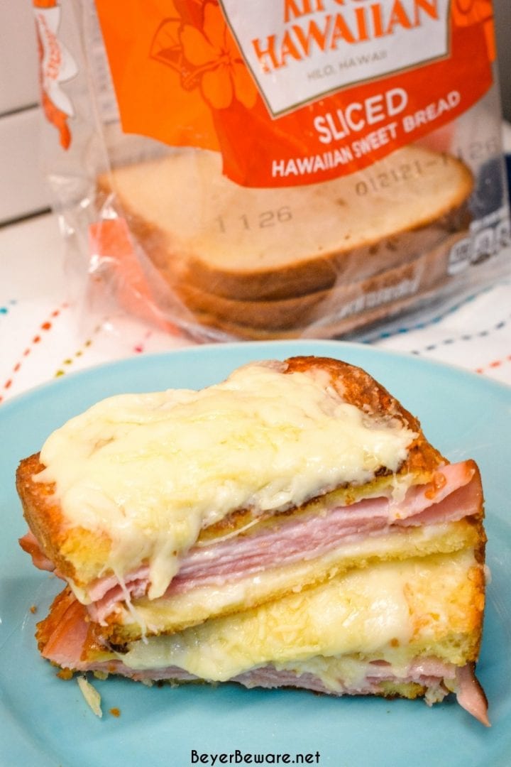 Croque Monsieur is an over the top grilled ham and cheese sandwich recipe that is made with King's Hawaiian bread, Smithfield smoked ham, swiss and gruyere cheese, and a mustard Bechamel sauce.