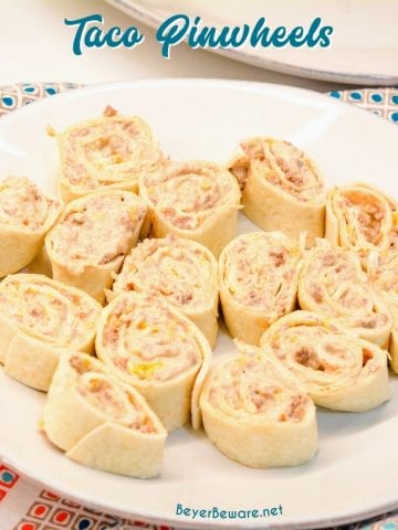 Taco pinwheels are the perfect way to use up leftover taco meat and tortilla shells in a different way than just as tacos again by simply mixing cream cheese, salsa, and taco meat together and spreading over the tortilla shell before rolling up into a pinwheel.