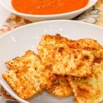 Air Fryer Ravioli is a homemade version of St. Louis style toasted ravioli in the air fryer made with cheese ravioli dipped in an egg wash and then breaded with parmesan cheese and bread crumbs then air fried.