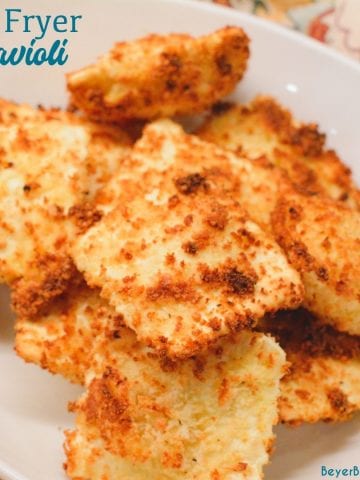 Air Fryer Ravioli is a homemade version of St. Louis style toasted ravioli in the air fryer made with cheese ravioli dipped in an egg wash and then breaded with parmesan cheese and bread crumbs then air fried.