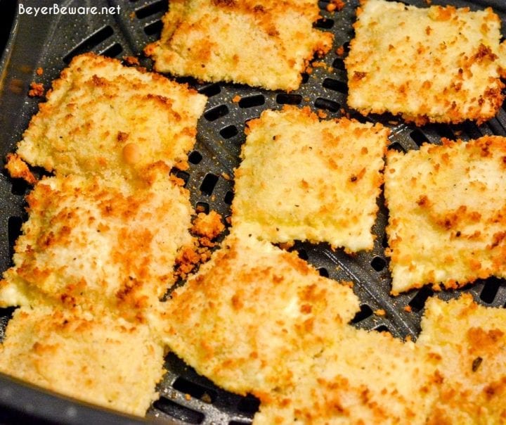 Air Fryer Ravioli is a homemade version of St. Louis style toasted ravioli in the air fryer made with cheese ravioli dipped in an egg wash and then breaded with parmesan cheese and bread crumbs then air fried.