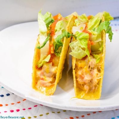 Creamy chicken baked tacos may have just become the best version of baked tacos made quickly with shredded chicken, Rotel, and cream cheese and piled into corn taco shells and baked to cheesy perfection.