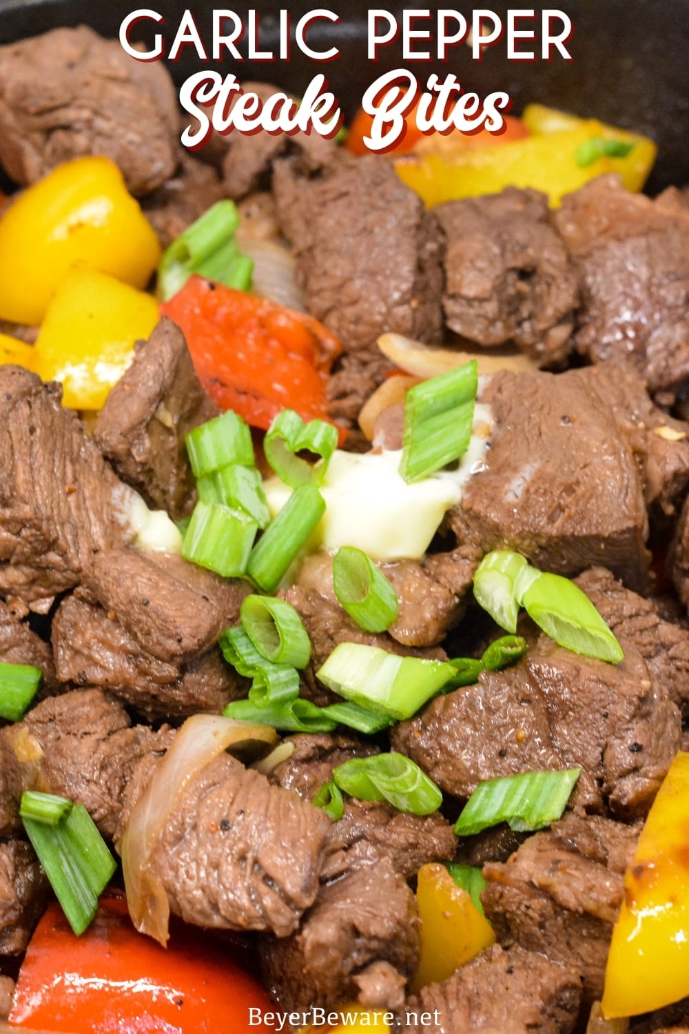 Garlic pepper steak bites recipe is an easy cast iron steak skillet meal made with an easy marinated sirloin steak, garlic, onions, and bell peppers served over mashed potatoes or rice.
