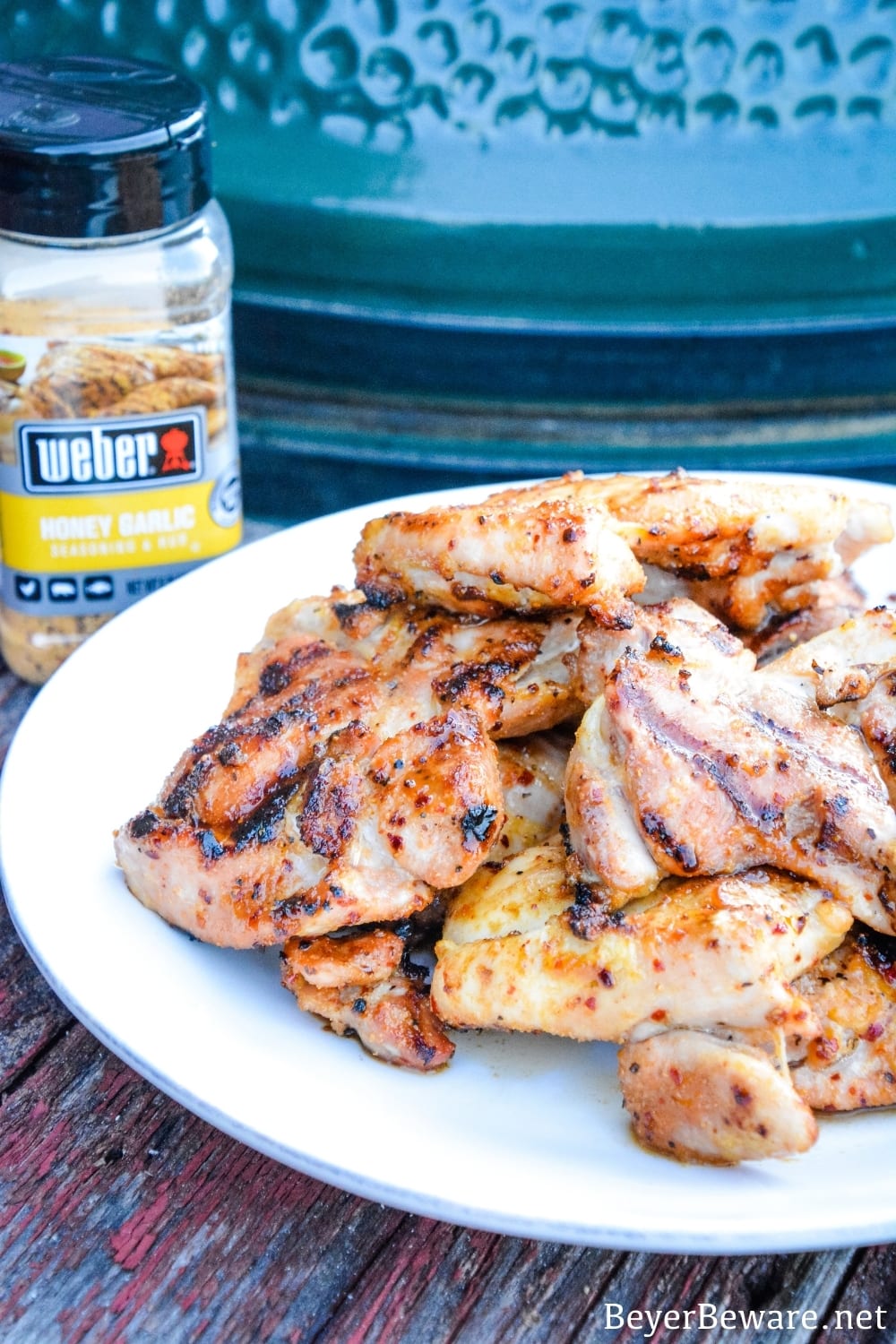 Grilled chicken no longer has to be dry and tough with this simple method for how to make the best grilled chicken recipe with boneless, skinless chicken thighs and honey garlic seasoning.