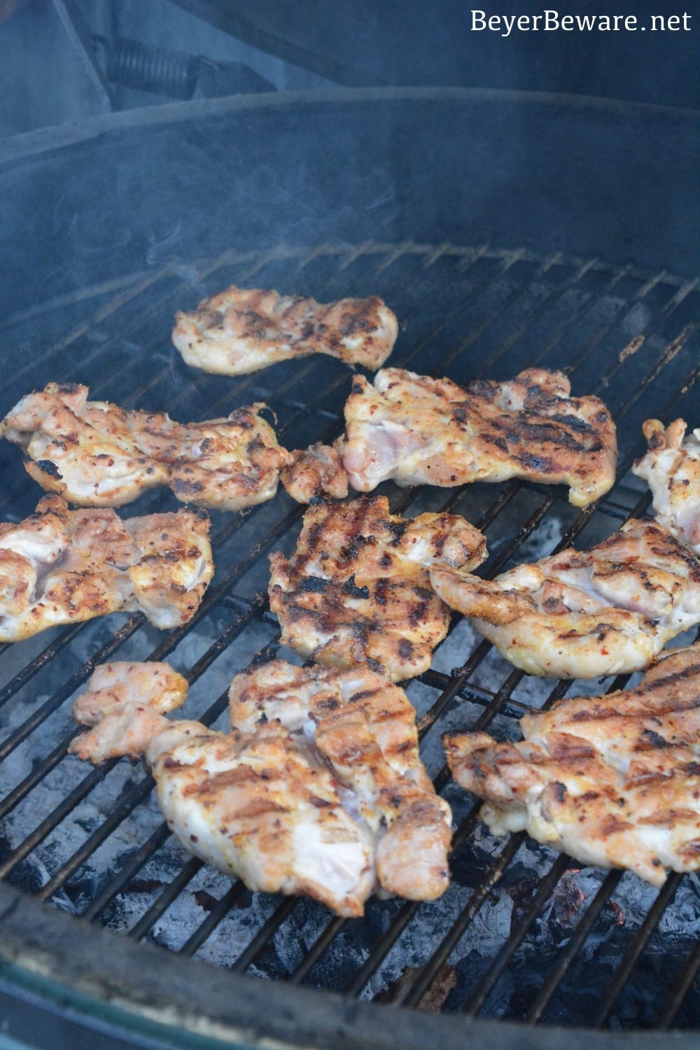 Grilled chicken no longer has to be dry and tough with this simple method for how to make the best grilled chicken recipe with boneless, skinless chicken thighs and honey garlic seasoning.