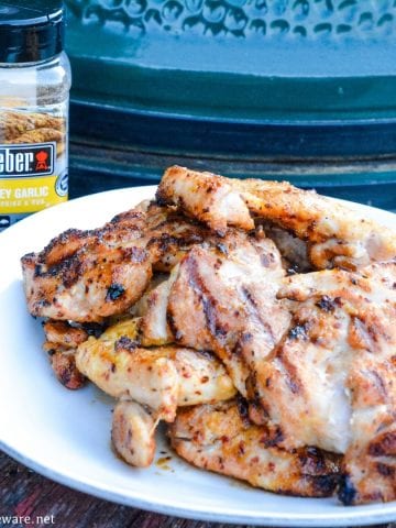 Grilled chicken no longer has to be dry and tough with this simple method for how to make the best grilled chicken recipe with boneless, skinless chicken thighs and honey garlic seasoning.