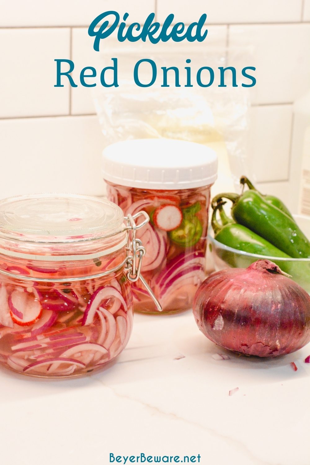 Pickled red onions are easy to make with onions, lime juice, jalapenos, radishes, and vinegar and the perfect topping for tacos, salads, and sandwiches.