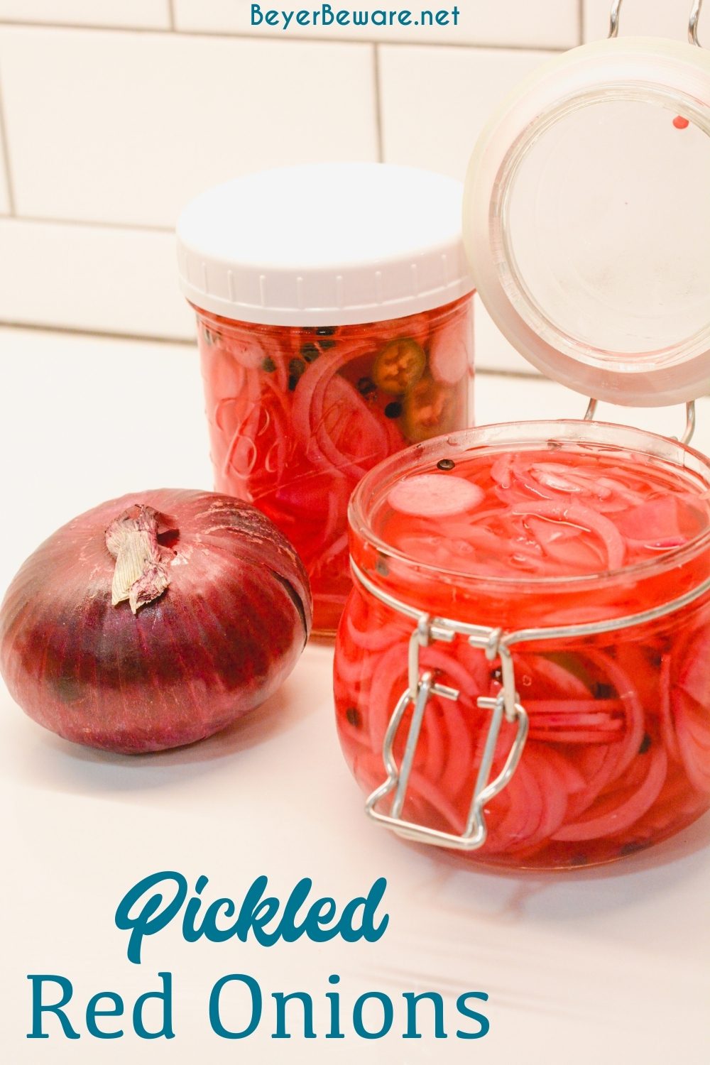 Pickled red onions are easy to make with onions, lime juice, jalapenos, radishes, and vinegar and the perfect topping for tacos, salads, and sandwiches.