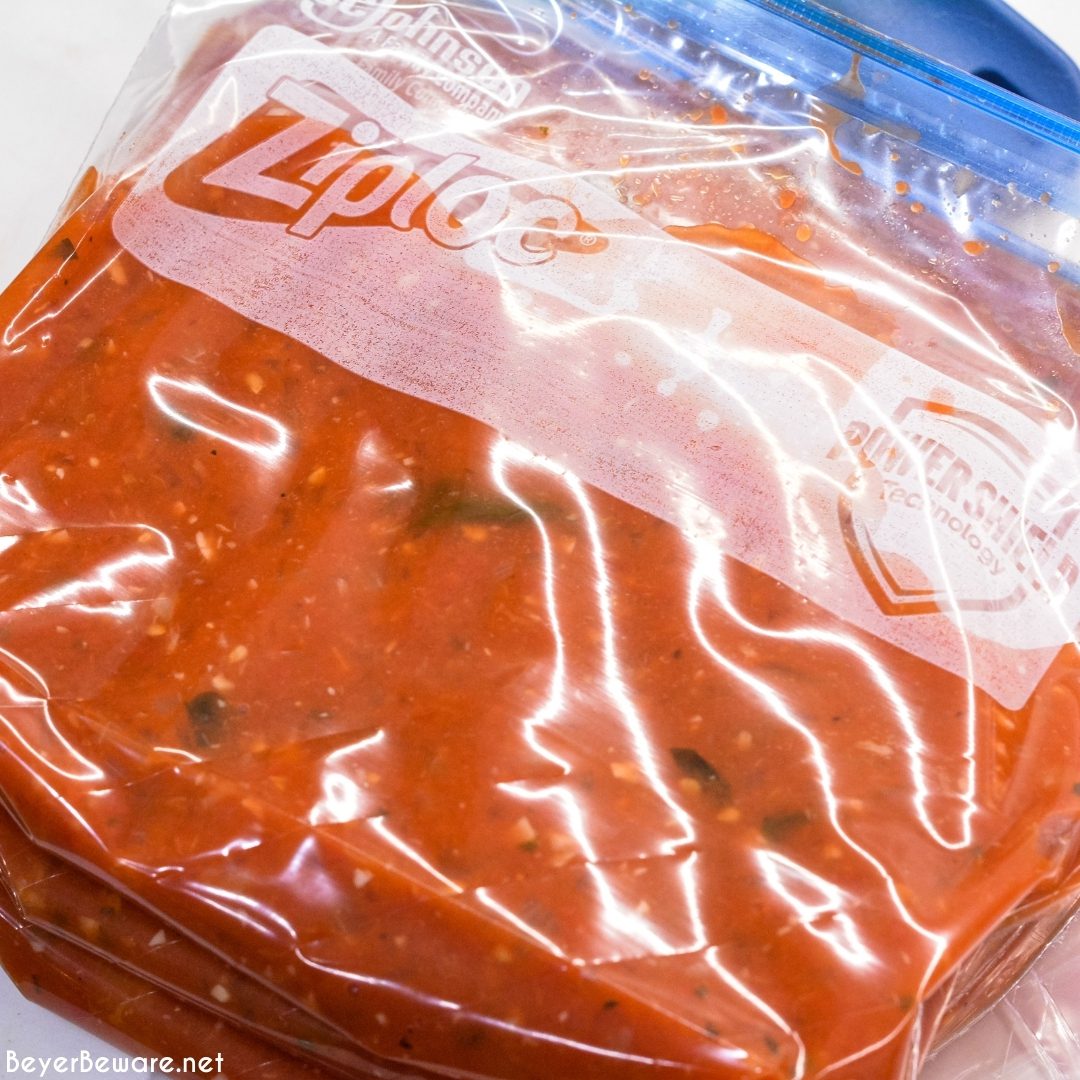 Freezer bags filled with homemade tomato sauce